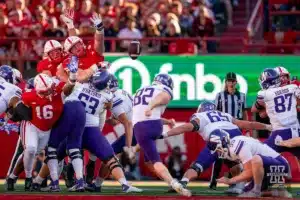 Nebraska Cornhuskers defensive line tries to block a kick during a game between the Northwestern Wildcats and the Nebraska Cornhuskers in Lincoln, NE on Thursday October 21st, 2023. Photo by Eric Francis