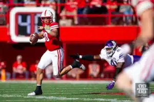 Nebraska Cornhuskers Heinrich Haarberg (10) out runs Northwestern Wildcats Jaylen Pate (41) to throw a pass in the second quarter during a college football game on Saturday, October 21, 2023, in Lincoln, Nebraska. Photo by John S. Peterson.