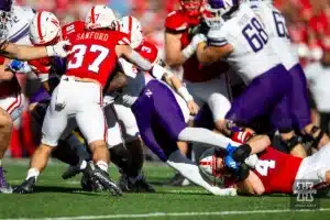 Nebraska Cornhuskers Luke Reimer (4) and Phalen Sanford (37) make a tackle against the Northwestern Wildcats during a college football game on Saturday, October 21, 2023, in Lincoln, Nebraska. Photo by John S. Peterson.