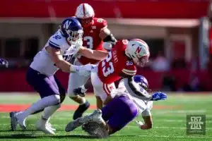 DUPLICATE***Nebraska Cornhuskers Anthony Grant (23) dives over Northwestern Wildcats Theran Johnson (10) in the first quarter during a college football game on Saturday, October 21, 2023, in Lincoln, Nebraska. Photo by John S. Peterson.