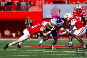 Nebraska Cornhuskers Isaac Gifford (2) tackles Northwestern Wildcats A.J. Henning (8) in the first quarter during a college football game on Saturday, October 21, 2023, in Lincoln, Nebraska. Photo by John S. Peterson.