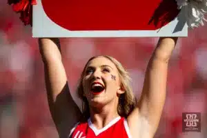 Nebraska Cornhusker cheerleader leading a cheer during a college football game against the Northwestern Wildcats on Saturday, October 21, 2023, in Lincoln, Nebraska. Photo by John S. Peterson.