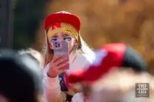 Nebraska Cornhusker fan waiting for the Huskers to arrive for the Unity Walk before taking on Northwestern Wildcats during a college football game on Saturday, October 21, 2023, in Lincoln, Nebraska. Photo by John S. Peterson.