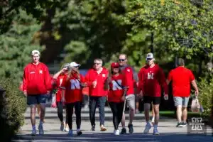 Nebraska Cornhusker fans make their way to Memorial Stadium to watch the game against Northwestern during a college football game on Saturday, October 21, 2023, in Lincoln, Nebraska. Photo by John S. Peterson.