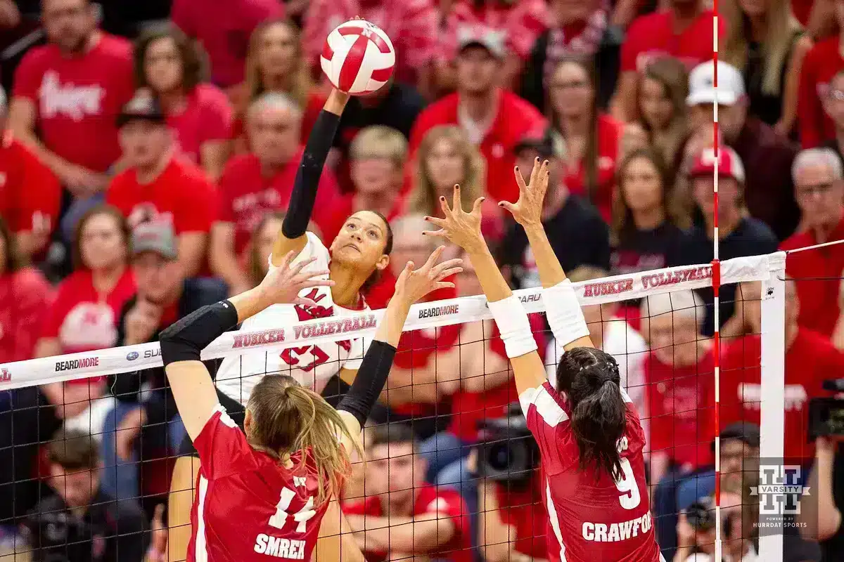 JP231021_VB_NU_v_WI_3378.jpg Nebraska Cornhusker Harper Murray (27) spikes the ball against Wisconsin Badgers Anna Smrek (14) and CC Crawford (9) in the fourth set during a college volleyball match on Saturday, October 21, 2023, in Lincoln, Nebraska. Photo by John S. Peterson.