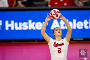 Nebraska Cornhusker Bergen Reilly (2) set the ball against the Wisconsin Badgers in the fourth set during a college volleyball match on Saturday, October 21, 2023, in Lincoln, Nebraska. Photo by John S. Peterson.
