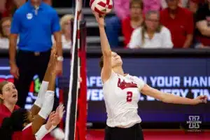 Nebraska Cornhusker Bergen Reilly (2) tips the ball against the Wisconsin Badgers in the fourth set during a college volleyball match on Saturday, October 21, 2023, in Lincoln, Nebraska. Photo by John S. Peterson.