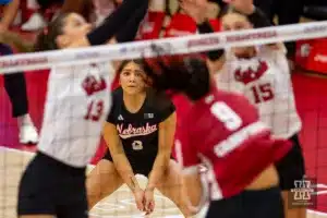 Nebraska Cornhusker Lexi Rodriguez (8) is ready to dig against the Wisconsin Badgers in the first set during a college volleyball match on Saturday, October 21, 2023, in Lincoln, Nebraska. Photo by John S. Peterson.