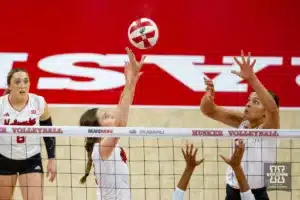 Nebraska Cornhusker Bergen Reilly (2) sets the ball for Bekka Allick (5) against the Wisconsin Badgers in the second set during a college volleyball match on Saturday, October 21, 2023, in Lincoln, Nebraska. Photo by John S. Peterson.