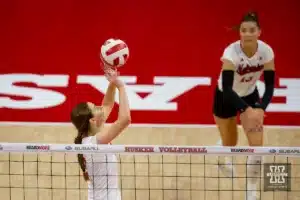 Nebraska Cornhusker Bergen Reilly (2) sets the ball against the Wisconsin Badgers in the second set during a college volleyball match on Saturday, October 21, 2023, in Lincoln, Nebraska. Photo by John S. Peterson.