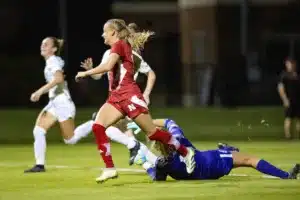Nebraska Cornhuskers Sadie Waite (11) celebrates her goal against Purdue Boilermakers Charlotte Cyr (1) in the second half during a college soccer game on Thursday, October 19, 2023, in Lincoln, Nebraska. Photo by John S. Peterson.