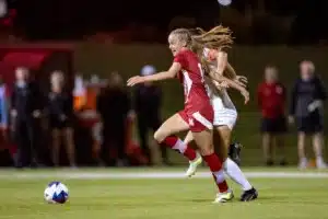 Nebraska Cornhuskers Sadie Waite (11) on the attack against Purdue Boilermakers Abigail Roy (18) in the second half during a college soccer game on Thursday, October 19, 2023, in Lincoln, Nebraska. Photo by John S. Peterson.