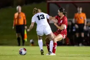 Nebraska Cornhuskers Haley Peterson (2) works to get the ball away from Purdue Boilermakers Megan Hutchinson (13) in the first half during a college soccer game on Thursday, October 19, 2023, in Lincoln, Nebraska. Photo by John S. Peterson.