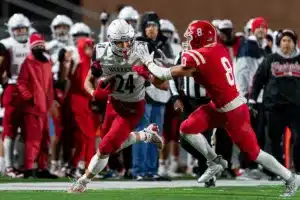 Westside High School Trevor Spady (24) tries to elude Millard South’s Kaleb Panowicz during a game between the Millard South and Omaha Westside in Omaha, NE on Sunday October 13th, 2023. Photo by Eric Francis
