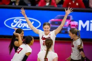 Nebraska Cornhusker Lindsay Krause (22) celebrates a kill against the Penn State Nittany Lions in the third set during a college volleyball match on Saturday, October 14, 2023, in Lincoln, Nebraska. Photo by John S. Peterson.