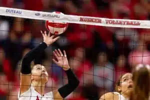 Nebraska Cornhusker Merritt Beason (13) tips the ball against the Penn State Nittany Lions  during a college volleyball match on Saturday, October 14, 2023, in Lincoln, Nebraska. Photo by John S. Peterson.