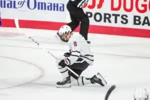 Omaha Mavericks forward Ray Fust (8) celebrates his goal in the second period against the Niagara Purple Eagles during a college hockey match on Friday, October 13, 2023, in Omaha, Nebraska. Photo by John S. Peterson.