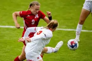Nebraska Cornhuskers Eleanor Dale (9) fights for the ball against Maryland Terrapins defender Katie Coyle (9) in the second half during a college soccer match Thursday, October 12, 2023, in Lincoln, Neb. Photo by John S. Peterson.