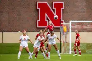 Nebraska Cornhuskers Sarah Weber (42) tries to head the ball against Maryland Terrapins midfielder Sofi Vinas (8) in the first half during a college soccer match Thursday, October 12, 2023, in Lincoln, Neb. Photo by John S. Peterson.