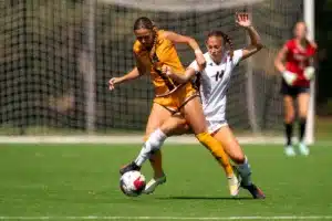 University of Nebraska Omaha Grace Bartlam (14) during a game between against Wyoming Sunday in Omaha, Nebraska August 27, 2023.  Photo by Eric Francis