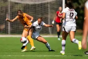 University of Nebraska Omaha Grace Bartlam (14) during a game between against Wyoming Sunday in Omaha, Nebraska August 27, 2023.  Photo by Eric Francis