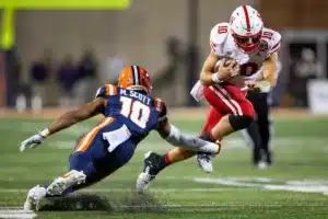 Nebraska Cornhuskers Heinrich Haarberg (10) tackled by Fighting Illini defensive back Miles Scott (10)during a college football game in Lincoln, Nebraska, Friday, October 6, 2023. Photo by John Peterson.
