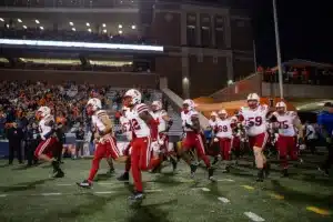 Nebraska Cornhuskers run out on to the filed to take on the Illinois Fighting Illini during a college football game in Lincoln, Nebraska, Friday, October 6, 2023. Photo by John Peterson.