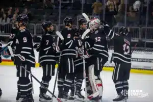 Omaha Mavericks celebrate the win over the Augustana Vikings during the hockey match on Saturday, November 25, 2023, in Sioux Falls, SD. Photo by John S. Peterson.