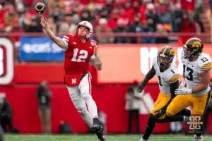 Nebraska Cornhuskers quarterback Chubba Purdy (12) rolls out and scans the field during a game against the Iowa Hawkeyes in Lincoln, NE November 24th 2023. Photo by Eric Francis