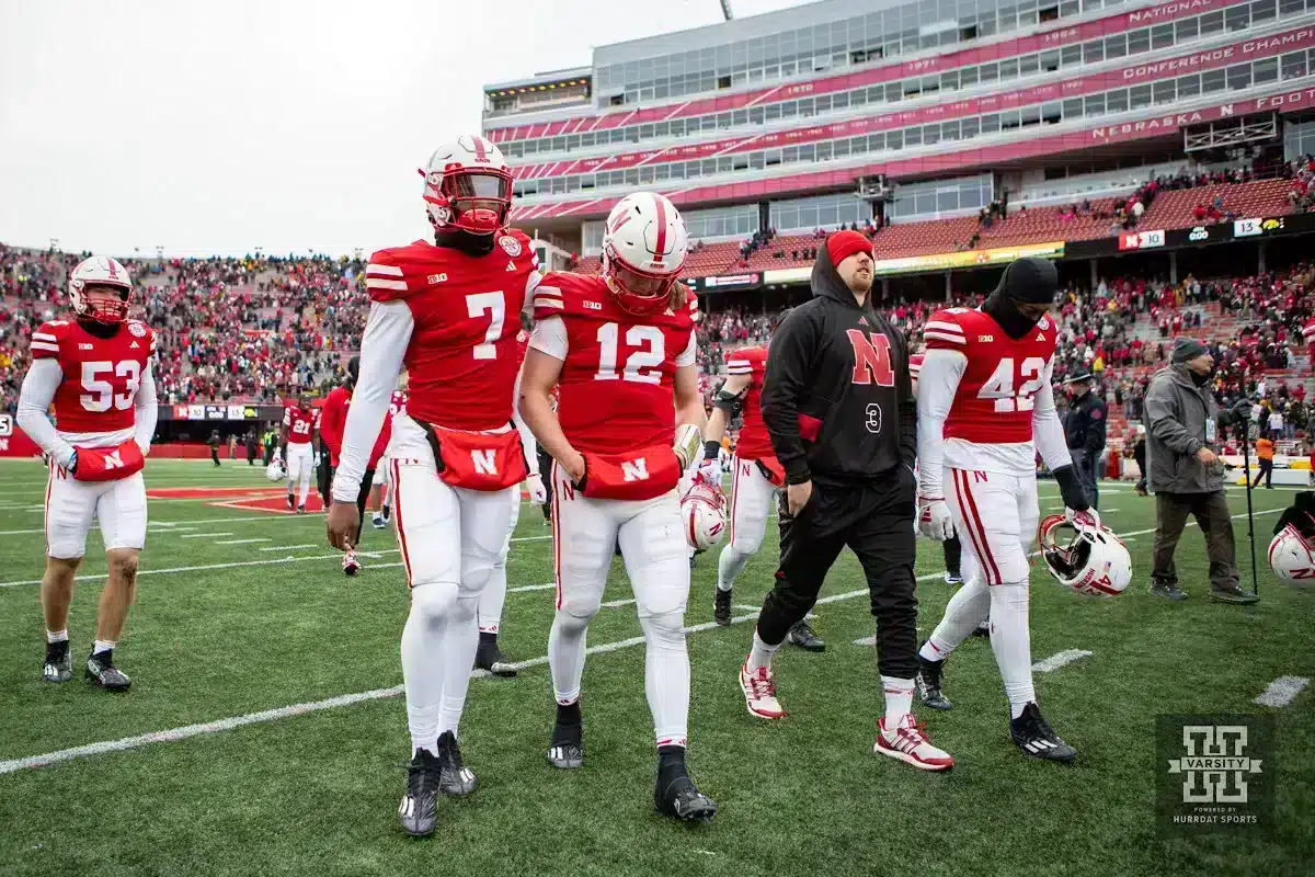 JP231124_FB_NEB_IA_4290_WM.jpg Nebraska Cornhusker quarterback Chubba Purdy (12) walks off the field with quarterback Jeff Sims (7) after the loss to Iowa Hawkeyes in the final seconds during the football game on Thursday, November 24, 2023, in Lincoln, Neb. Photo by John S. Peterson.