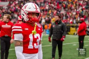 Nebraska Cornhusker defensive back Malcolm Hartzog (13) walks off the field after the loss to the against the Iowa Hawkeyes in the finals seconds during the football game on Thursday, November 24, 2023, in Lincoln, Neb. Photo by John S. Peterson.