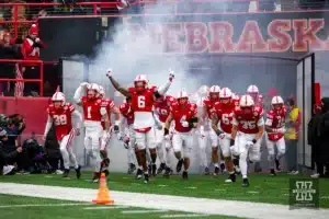 Nebraska Cornhusker defensive back Quinton Newsome (6) leads the Huskers out of the tunnel to take on the Iowa Hawkeyes during the football game on Thursday, November 24, 2023, in Lincoln, Neb. Photo by John S. Peterson.