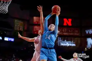 Creighton Bluejay forward Mallory Brake (14) grabs the rebound against Nebraska Cornhusker center Alexis Markowski (40) during the basketball game on Sunday, November 19, 2023, in Lincoln, Nebraska. Photo by John S. Peterson.