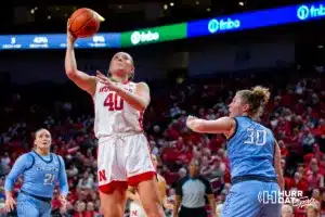 Nebraska Cornhusker center Alexis Markowski (40) makes a layup against Creighton Bluejay forward Morgan Maly (30) in the third quarter during the basketball game on Sunday, November 19, 2023, in Lincoln, Nebraska. Photo by John S. Peterson.