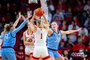 Creighton Bluejay forward Morgan Maly (30) defends against Nebraska Cornhusker guard Jaz Shelley (1) during the basketball game on Sunday, November 19, 2023, in Lincoln, Nebraska. Photo by John S. Peterson.