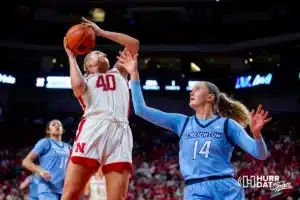 Nebraska Cornhusker center Alexis Markowski (40) makes a layup against Creighton Bluejay forward Mallory Brake (14) in the third quarter during the basketball game on Sunday, November 19, 2023, in Lincoln, Nebraska. Photo by John S. Peterson.