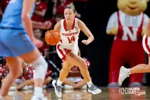 Nebraska Cornhusker guard Callin Hake (14) dribbles the ball down the court against the Creighton Bluejays in the third quarter during the basketball game on Sunday, November 19, 2023, in Lincoln, Nebraska. Photo by John S. Peterson.