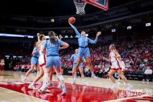 Creighton Bluejay forward Mallory Brake (14) grabs the rebound against the Nebraska Cornhuskers during the basketball game on Sunday, November 19, 2023, in Lincoln, Nebraska. Photo by John S. Peterson.