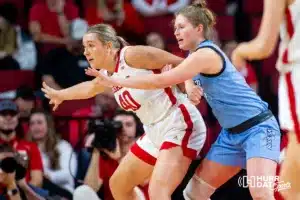 Creighton Bluejay forward Morgan Maly (30) defends against Nebraska Cornhusker center Alexis Markowski (40) in the second quarter during the basketball game on Sunday, November 19, 2023, in Lincoln, Nebraska. Photo by John S. Peterson.