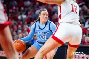 Creighton Bluejay guard Molly Mogensen (21) dribbles the ball against Nebraska Cornhusker forward Jessica Petrie (12) in the second quarter during the basketball game on Sunday, November 19, 2023, in Lincoln, Nebraska. Photo by John S. Peterson.