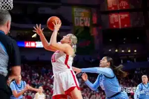 Nebraska Cornhusker center Alexis Markowski (40) makes a layup against Creighton Bluejay guard Jayme Horan (12) in the first quarter during the basketball game on Sunday, November 19, 2023, in Lincoln, Nebraska. Photo by John S. Peterson.
