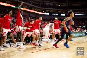 Nebraska Cornhuskers bench celebrates a three point shot by Jamarques Lawrence against Duquesne Duke guard Kailon Nicholls (55) in the second half during the college basketball game on Wednesday November 22, 2023, in Lincoln, Neb. Photo by John S. Peterson.