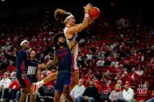 Nebraska Cornhusker forward Josiah Allick (53) fights for the rebound against Duquesne Duke guard Dae Dae Grant (3) in the second half during the college basketball game on Wednesday November 22, 2023, in Lincoln, Neb. Photo by John S. Peterson.