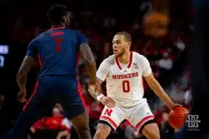 Nebraska Cornhusker guard C.J. Wilcher (0) dribbles the ball against Duquesne Duke forward David Dixon (2) in the first half during the college basketball game on Wednesday November 22, 2023, in Lincoln, Neb. Photo by John S. Peterson.