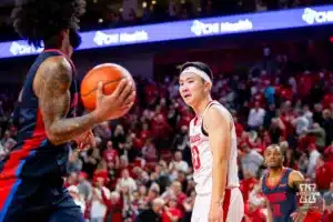 Nebraska Cornhusker guard Keisei Tominaga (30) reacts to Duquesne Duke guard Dae Dae Grant (3) after making a basket in the second half during the college basketball game on Wednesday November 22, 2023, in Lincoln, Neb. Photo by John S. Peterson.