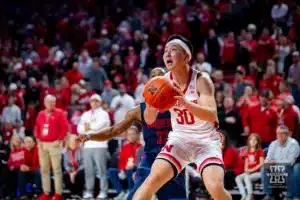 Nebraska Cornhusker guard Keisei Tominaga (30) drives the baseline for a basket against the Duquesne Dukes in the second half during the college basketball game on Wednesday November 22, 2023, in Lincoln, Neb. Photo by John S. Peterson.