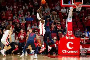 Nebraska Cornhusker forward Juwan Gary (4) and Duquesne Duke forward Fousseyni Drame (34) fight for the ball in the second half during the college basketball game on Wednesday November 22, 2023, in Lincoln, Neb. Photo by John S. Peterson.