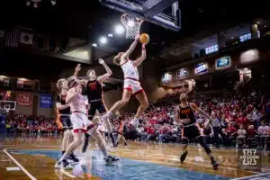 Nebraska Cornhusker forward Josiah Allick (53) makes a layup against Oregon State Beaver forward Tyler Bilodeau (34) in the second half during the basketball game on Saturday, November 18, 2023, in Sioux Falls, South Dakota. Photo by John S. Peterson.