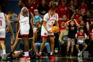 Nebraska Cornhusker guard Jarron Coleman (9) and a young Husker fan react to play on the court against the Oregon State Beavers in the second half during the basketball game on Saturday, November 18, 2023, in Sioux Falls, South Dakota. Photo by John S. Peterson.