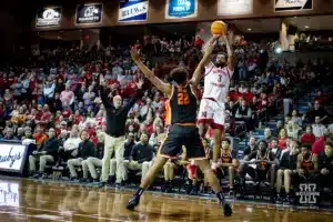 Nebraska Cornhusker guard Brice Williams (3) makes a three against Oregon State Beaver forward Thomas Ndong (22) in the first half during the basketball game on Saturday, November 18, 2023, in Sioux Falls, South Dakota. Photo by John S. Peterson.